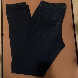 Levis 524 dark denim skinny jeans